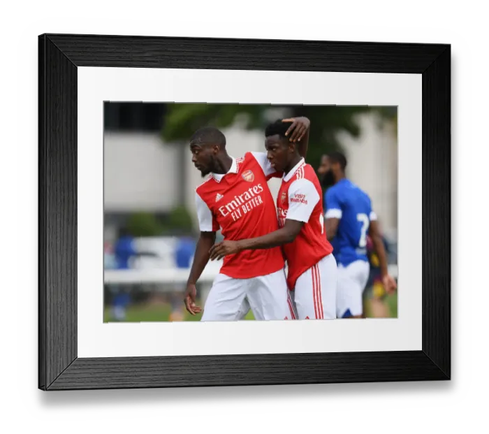 Framed Print : Arsenal's Nketiah and Pepe Celebrate First Goal in Pre-Season Victory over Ipswich Town Framed Print : Arsenal's Nketiah and Pepe Celebrate First Goal in Pre-Season Victory over Ipswich Town