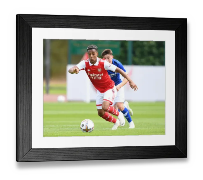 Framed Print : Arsenal's Omari Hutchinson in Action during Pre-Season Match against Ipswich Town Framed Print : Arsenal's Omari Hutchinson in Action during Pre-Season Match against Ipswich Town