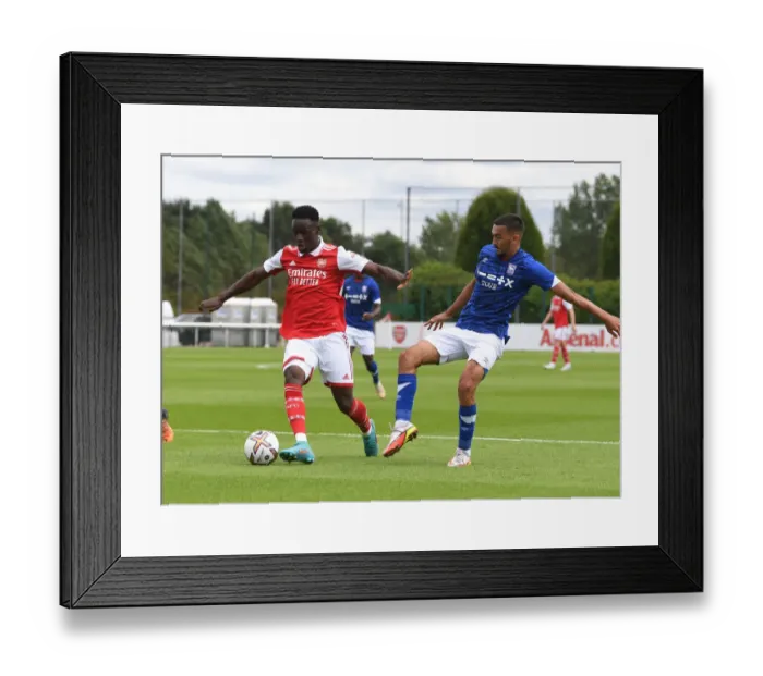 Framed Print : Arsenal's Flo Balogun in Pre-Season Action Against Ipswich Town
