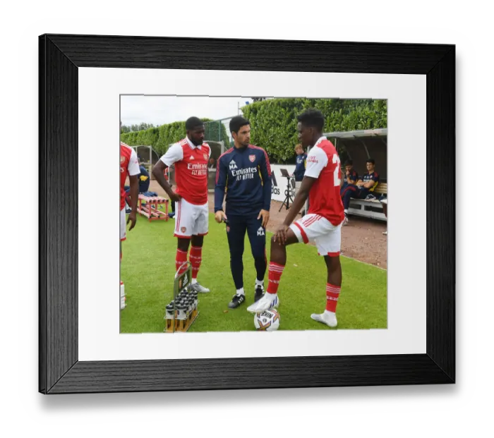 Framed Print : Arsenal Manager Mikel Arteta Strategizes with Players Ahead of Arsenal vs Ipswich Town (2022) Pre-Season Friendly