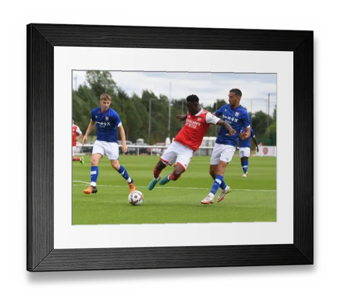 Framed Print : Arsenal's Flo Balogun Shines in Pre-Season Action Against Ipswich Town Framed Print : Arsenal's Flo Balogun Shines in Pre-Season Action Against Ipswich Town