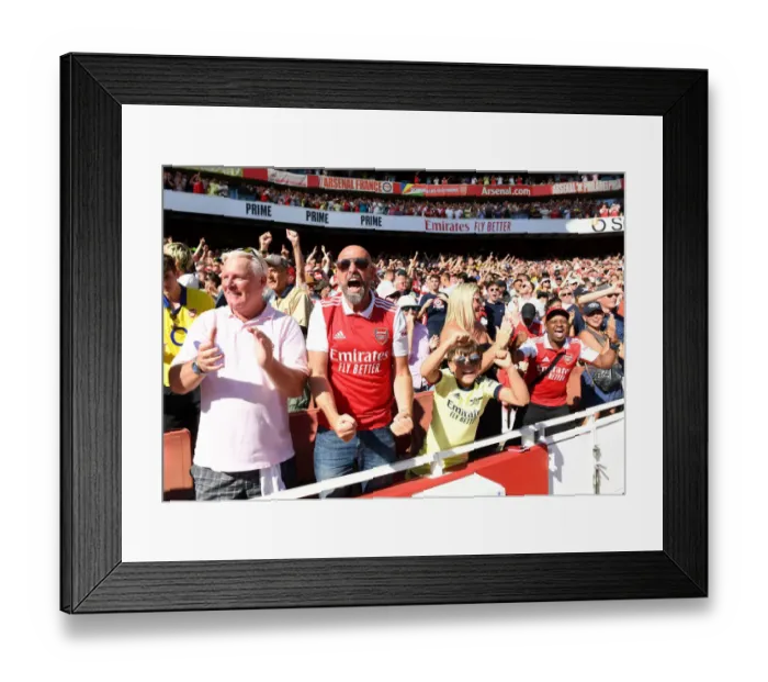 Framed Print : Arsenal Fans in Full Swing: Celebrating a Thrilling Victory over Leicester City (2022-23 Premier League)