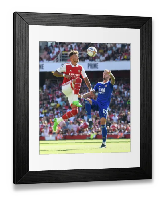 Framed Print : Arsenal vs Leicester: Battle for Premier League Supremacy - White vs Madison Clash at Emirates Stadium (2022-23)