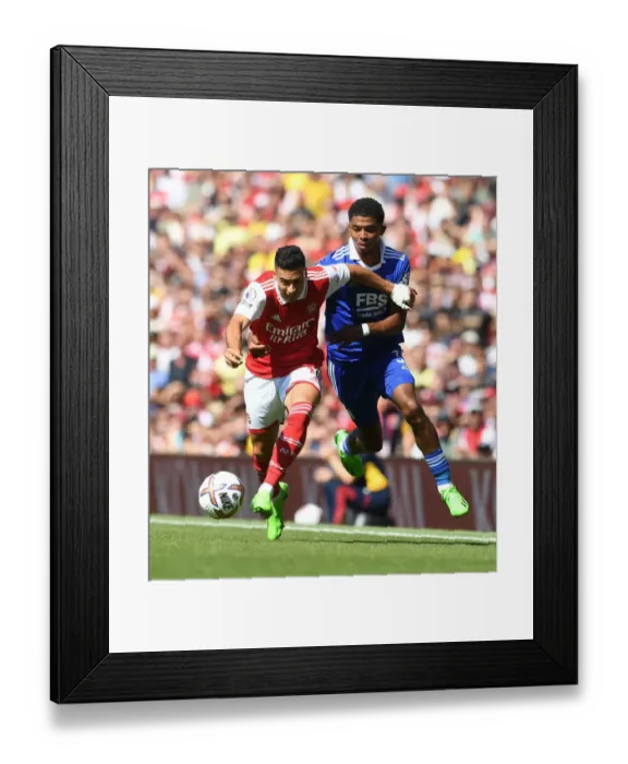 Framed Print : Arsenal's Martinelli Clashes with Leicester's Fofana in 2022-23 Premier League Showdown