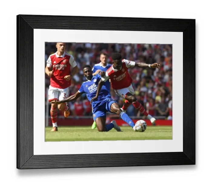 Framed Print : Arsenal vs Leicester: Bukayo Saka Clashes with Wilfred Ndidi in 2022-23 Premier League Showdown Framed Print : Arsenal vs Leicester: Bukayo Saka Clashes with Wilfred Ndidi in 2022-23 Premier League Showdown