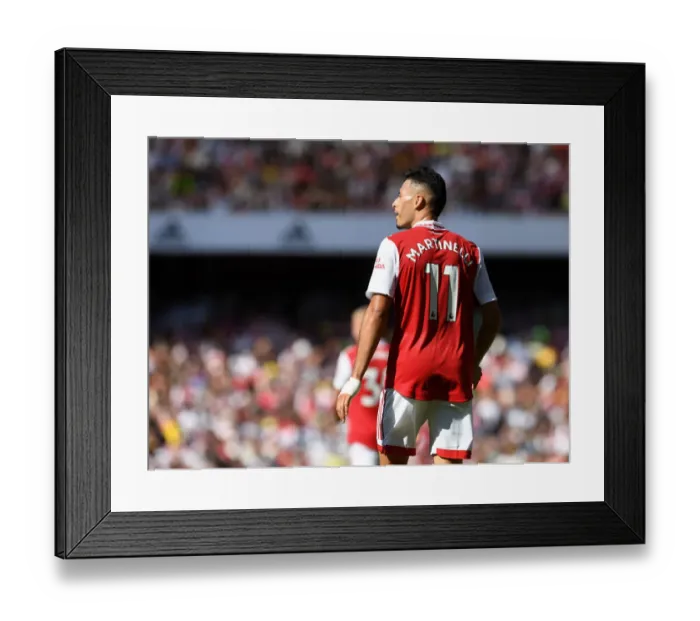 Framed Print : Martinelli Stands Firm: Arsenal's Battle against Leicester City in the 2022-23 Premier League