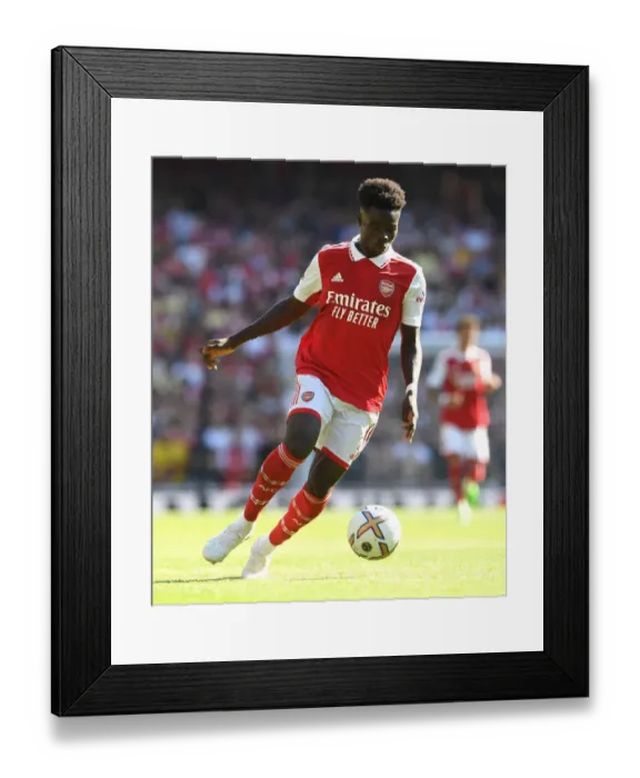 Framed Print : Arsenal's Bukayo Saka in Action: Arsenal vs. Leicester City, 2022-23 Premier League Clash at Emirates Stadium