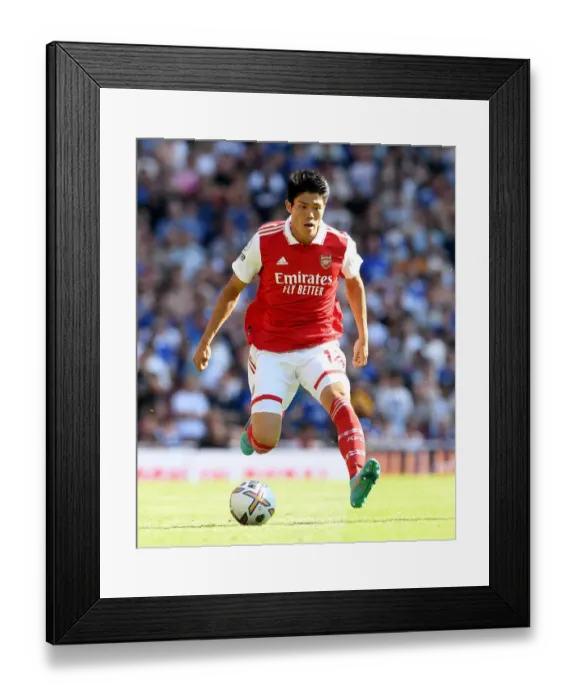 Framed Print : Arsenal's Tomiyasu in Action: Arsenal vs. Leicester City, 2022-23 Premier League Framed Print : Arsenal's Tomiyasu in Action: Arsenal vs. Leicester City, 2022-23 Premier League
