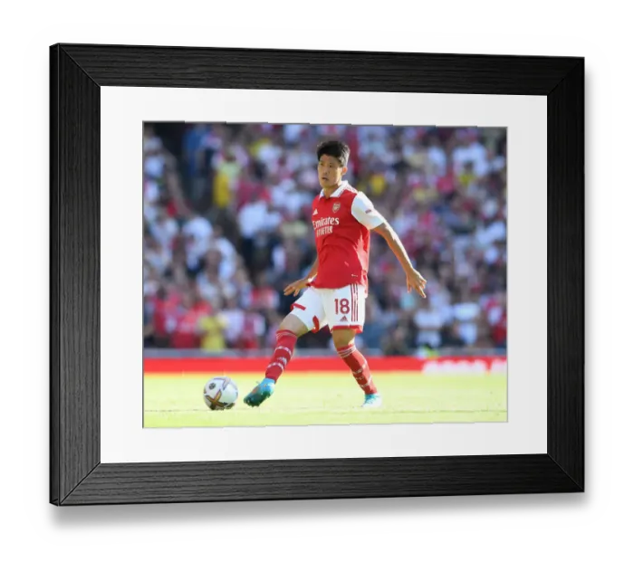 Framed Print : Arsenal's Tomiyasu in Action: Arsenal vs. Leicester City, Premier League 2022-23
