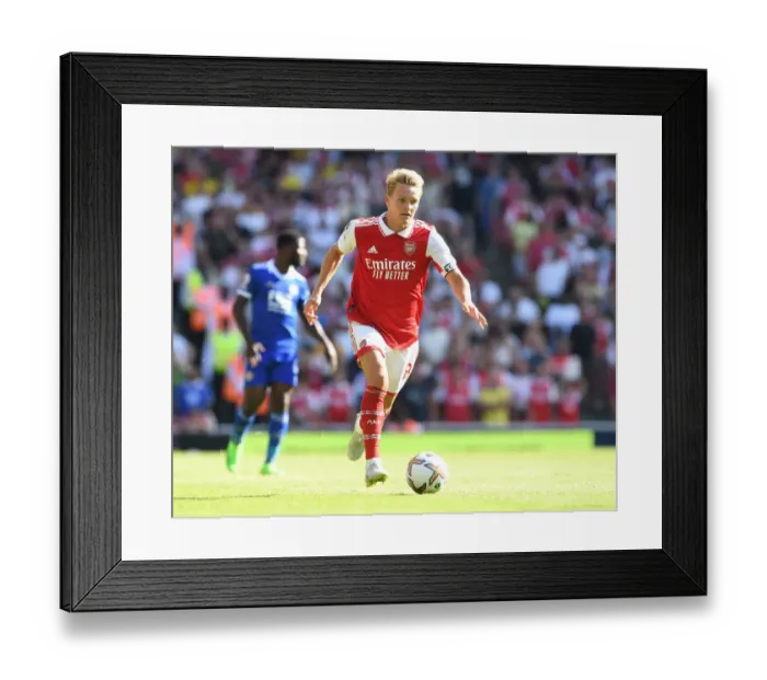 Framed Print : Arsenal's Martin Odegaard Faces Off Against Leicester City in 2022-23 Premier League Clash Framed Print : Arsenal's Martin Odegaard Faces Off Against Leicester City in 2022-23 Premier League Clash