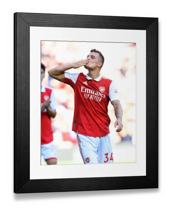 Framed Print : Granit Xhaka's Emotional Family Reunion: Arsenal's Victory Over Leicester City