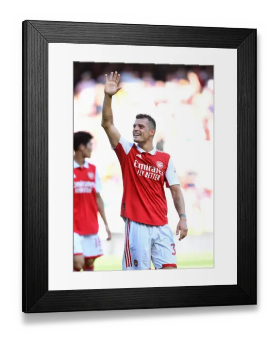 Framed Print : Granit Xhaka Embraces Family After Arsenal's Win Against Leicester City (Arsenal v Leicester City 2022-23)