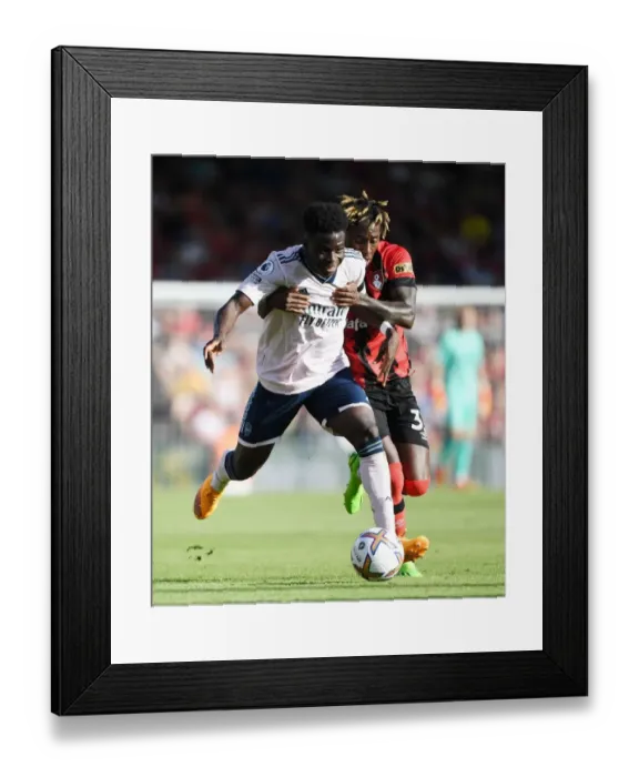 Framed Print : Bukayo Saka Darts Past Jordan Zemura: AFC Bournemouth vs Arsenal FC, 2022-23 Premier League Framed Print : Bukayo Saka Darts Past Jordan Zemura: AFC Bournemouth vs Arsenal FC, 2022-23 Premier League