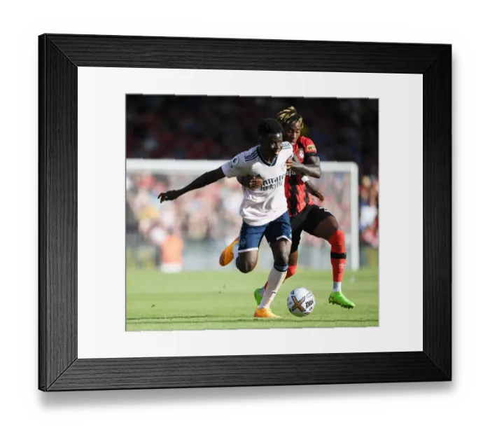 Framed Print : Bukayo Saka's Slick Moves: Outmaneuvering Jordan Zemura in AFC Bournemouth vs Arsenal FC, Premier League 2022-23