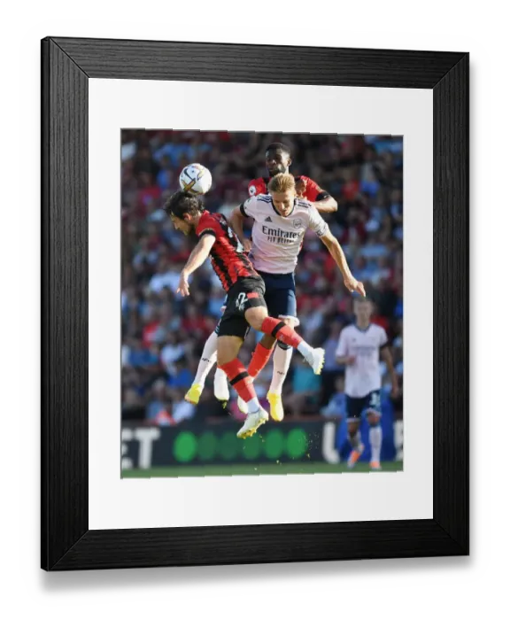 Framed Print : Odegaard Stands Firm: Arsenal's Midfield Battle against Bournemouth's Pearson and Lerma Framed Print : Odegaard Stands Firm: Arsenal's Midfield Battle against Bournemouth's Pearson and Lerma