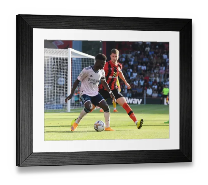 Framed Print : Bukayo Saka vs. Chris Mepham: AFC Bournemouth vs. Arsenal FC, Premier League 2022-23