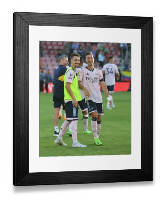 Framed Print : Arsenal's Martinelli and Vieira Celebrate Victory over AFC Bournemouth in 2022-23 Premier League