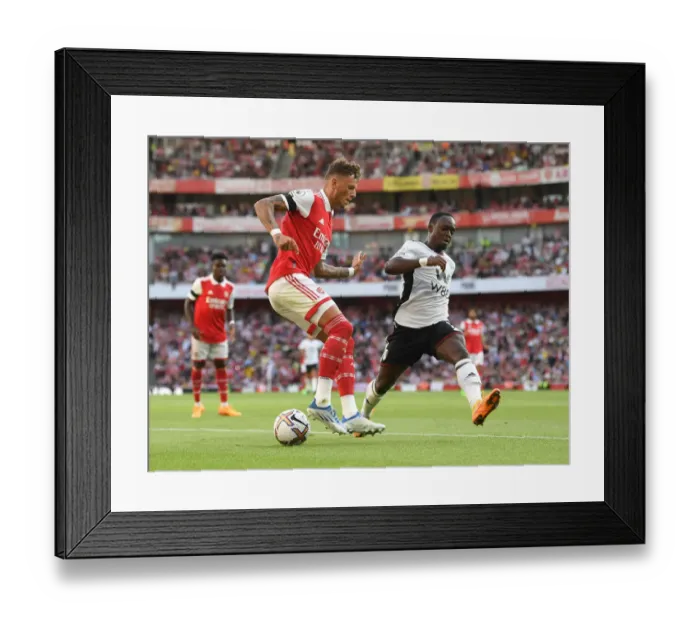 Framed Print : Arsenal's Ben White Faces Off Against Fulham's Neeskens Kebano in 2022-23 Premier League Clash Framed Print : Arsenal's Ben White Faces Off Against Fulham's Neeskens Kebano in 2022-23 Premier League Clash