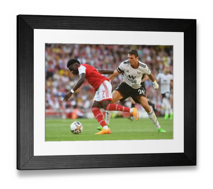 Framed Print : Saka vs. Palhinha: A Premier League Battle of Intense Determination Framed Print : Saka vs. Palhinha: A Premier League Battle of Intense Determination