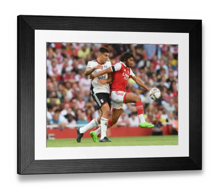 Framed Print : Arsenal vs Fulham: Elneny vs Mitrovic Clash in Premier League Showdown (2022-23) Framed Print : Arsenal vs Fulham: Elneny vs Mitrovic Clash in Premier League Showdown (2022-23)