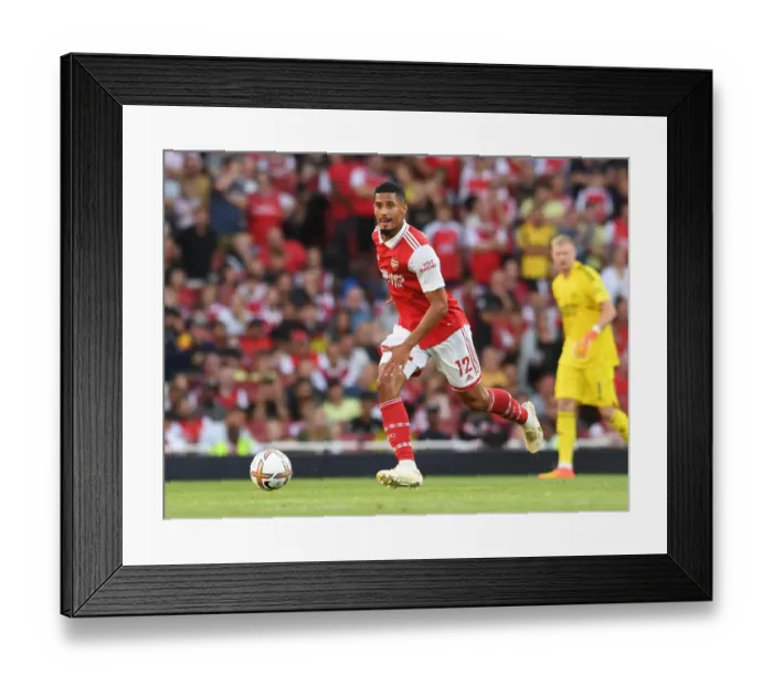 Framed Print : Arsenal's William Saliba Shines in Premier League Clash Against Fulham Framed Print : Arsenal's William Saliba Shines in Premier League Clash Against Fulham