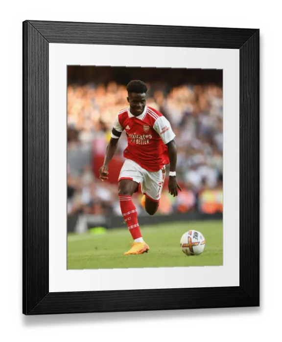 Framed Print : Arsenal's Bukayo Saka Shines in Arsenal FC vs. Fulham FC Premier League Clash (2022-23) Framed Print : Arsenal's Bukayo Saka Shines in Arsenal FC vs. Fulham FC Premier League Clash (2022-23)