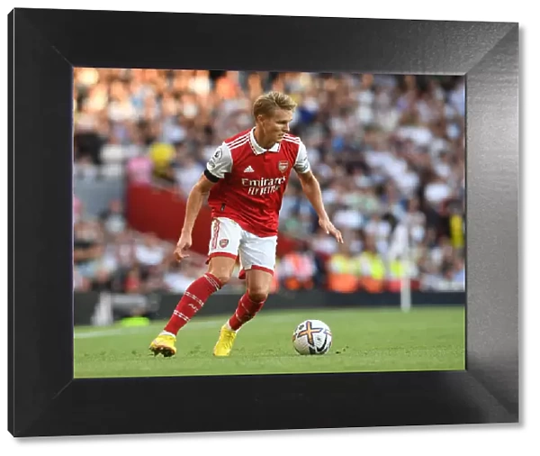 Arsenal's Martin Odegaard Shines in Arsenal FC vs. Fulham FC Premier League Clash (2022-23)