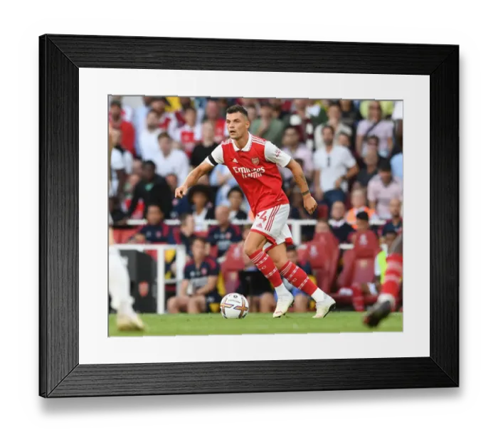 Framed Print : Granit Xhaka: Arsenal's Midfield Maestro Shines in Premier League Clash Against Fulham, 2022-23 Season Framed Print : Granit Xhaka: Arsenal's Midfield Maestro Shines in Premier League Clash Against Fulham, 2022-23 Season