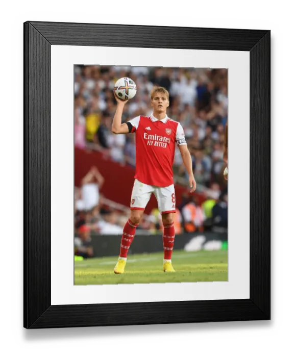 Framed Print : Martin Odegaard's Brilliant Performance: Arsenal's Triumph Over Fulham in Premier League