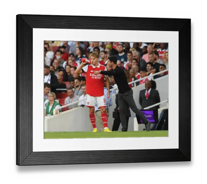 Framed Print : Arsenal's Arteta Gives Instructions to Odegaard During Arsenal v Fulham Premier League Clash (2022-23) Framed Print : Arsenal's Arteta Gives Instructions to Odegaard During Arsenal v Fulham Premier League Clash (2022-23)