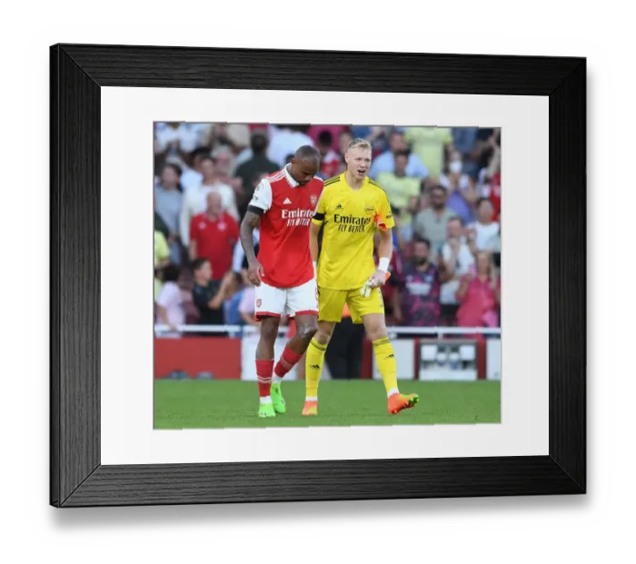 Framed Print : Arsenal Celebrate Win Against Fulham: Ramsdale and Magalhaes Embrace Framed Print : Arsenal Celebrate Win Against Fulham: Ramsdale and Magalhaes Embrace