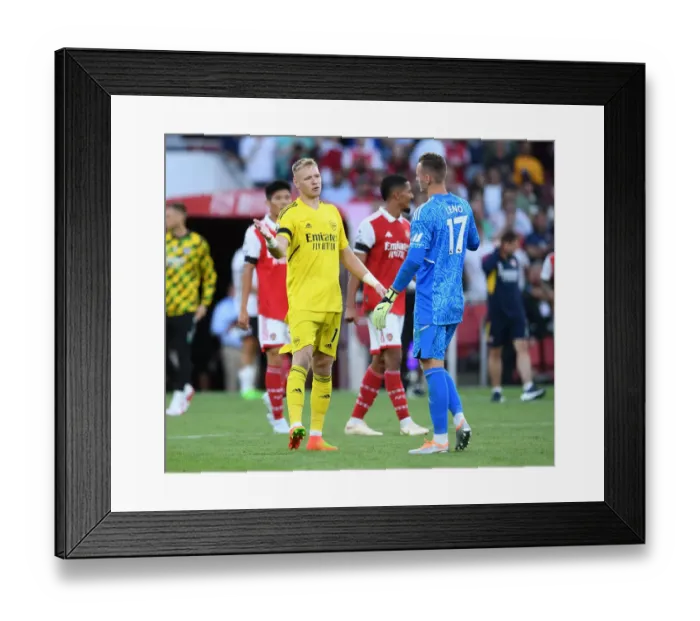 Framed Print : Arsenal's Ramsdale and Leno Clash in Arsenal vs. Fulham Premier League Showdown (2022-23)