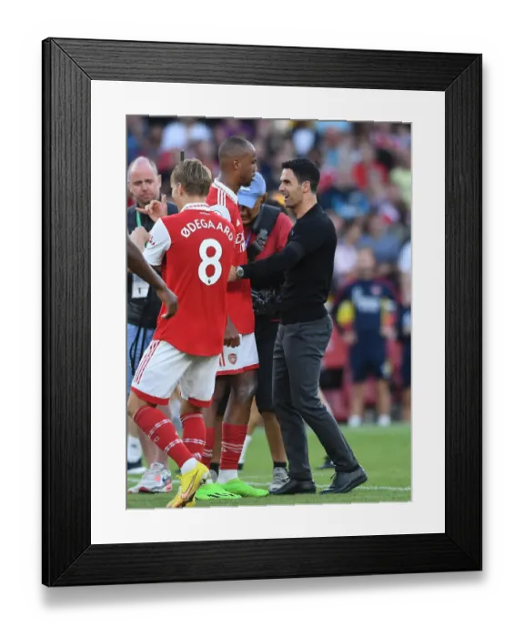 Framed Print : Arsenal's Arteta Celebrates with Magalhaes after Arsenal's Victory over Fulham (2022-23) Framed Print : Arsenal's Arteta Celebrates with Magalhaes after Arsenal's Victory over Fulham (2022-23)