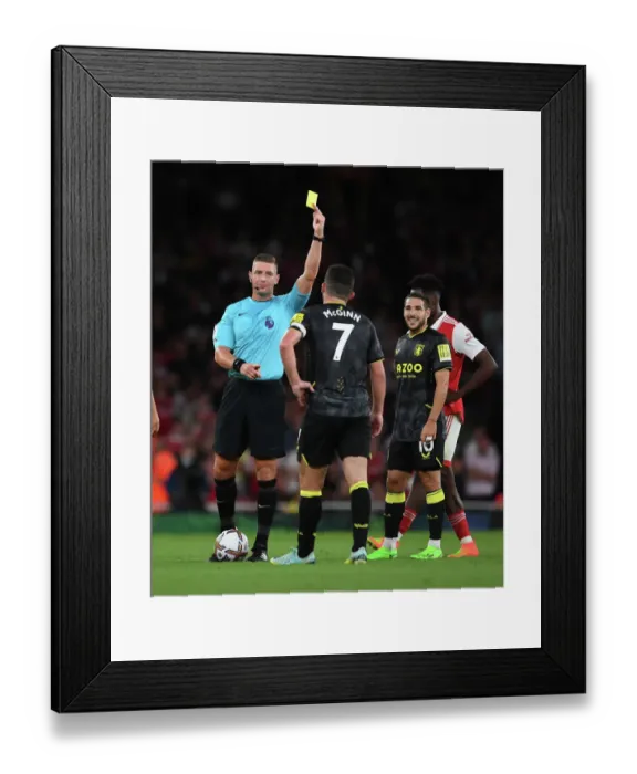 Framed Print : Arsenal vs Aston Villa: Referee Issues Yellow Card to John McGinn in 2022-23 Premier League Clash