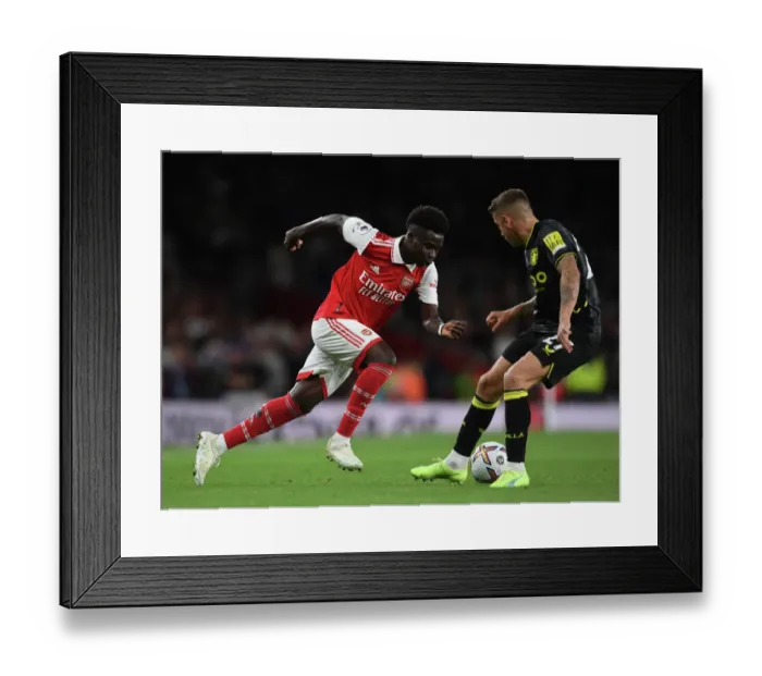 Framed Print : Saka vs. Digne: A Premier League Face-Off at the Emirates (2022-23)