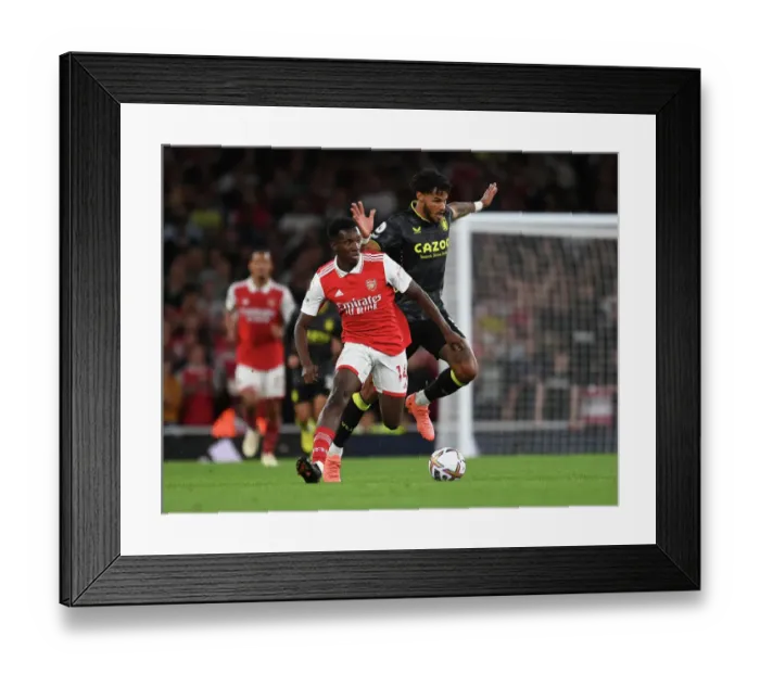Framed Print : Arsenal vs Aston Villa: Eddie Nketiah vs Tyrone Mings Clash in Premier League Showdown (2022-23) Framed Print : Arsenal vs Aston Villa: Eddie Nketiah vs Tyrone Mings Clash in Premier League Showdown (2022-23)