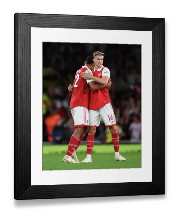 Framed Print : Arsenal's Holding and Saliba: Savoring Victory Over Aston Villa in the 2022-23 Premier League