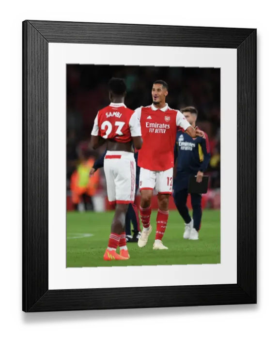 Framed Print : Arsenal's Saliba Euphoria: Celebrating Victory Over Aston Villa (2022-23)