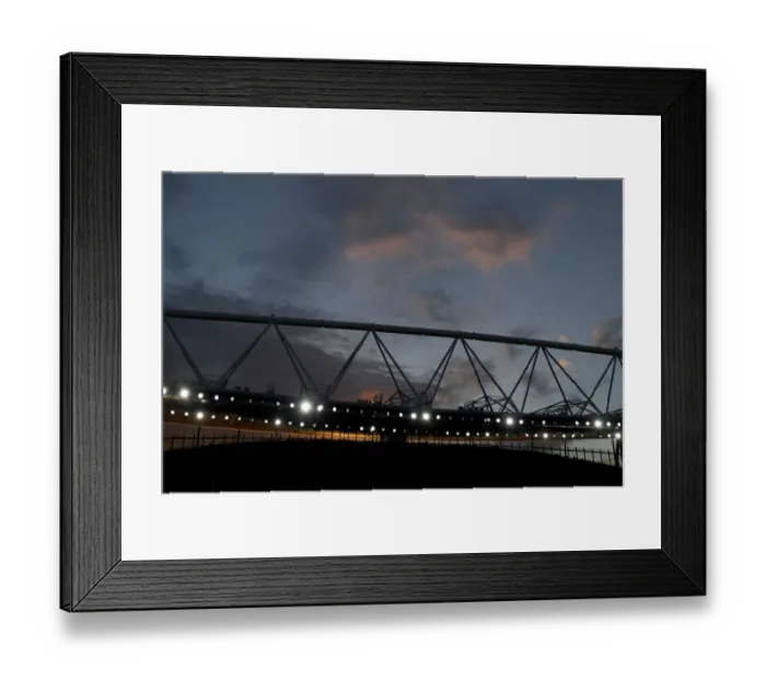 Framed Print : Arsenal vs Aston Villa: Sunset at the Emirates Stadium