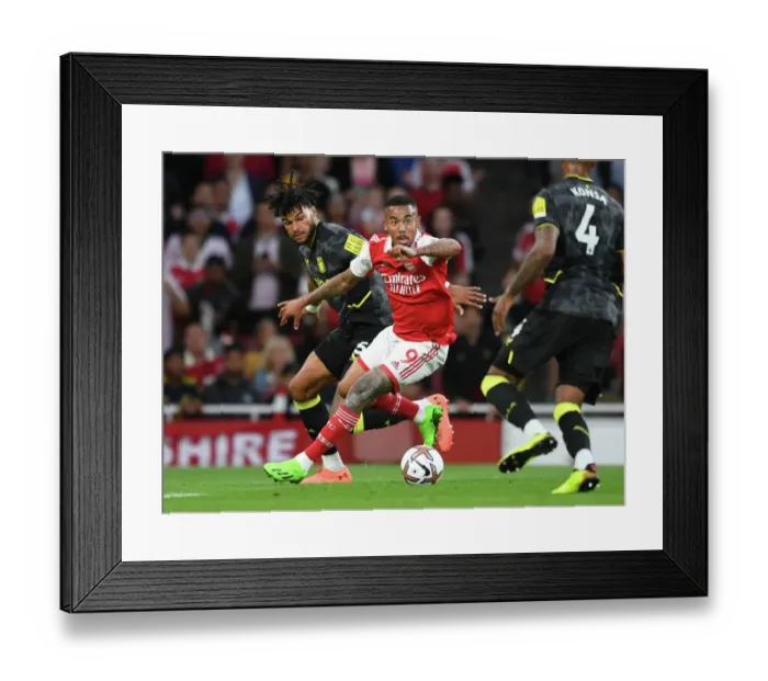 Framed Print : Gabriel Jesus vs Tyrone Mings: A Premier League Face-Off at the Emirates Framed Print : Gabriel Jesus vs Tyrone Mings: A Premier League Face-Off at the Emirates