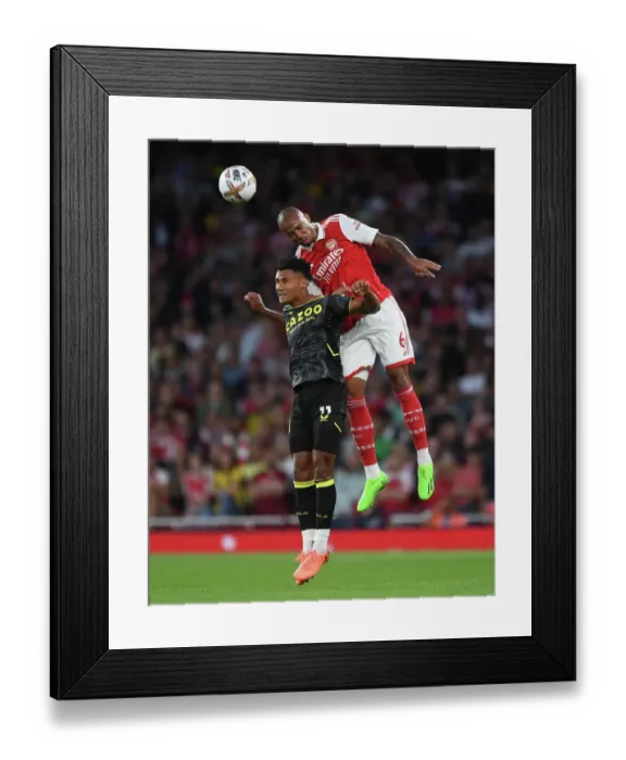 Framed Print : Arsenal's Gabriel Magalhaes Heads Ball Against Aston Villa in 2022-23 Premier League Clash