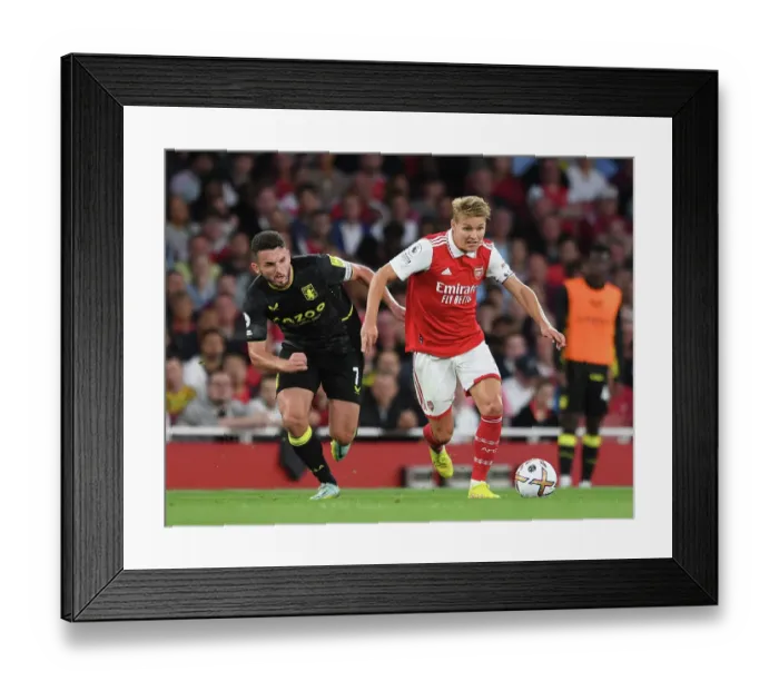 Framed Print : Arsenal vs Aston Villa: Martin Odegaard Clashes with John McGinn in Premier League Showdown (2022-23) Framed Print : Arsenal vs Aston Villa: Martin Odegaard Clashes with John McGinn in Premier League Showdown (2022-23)