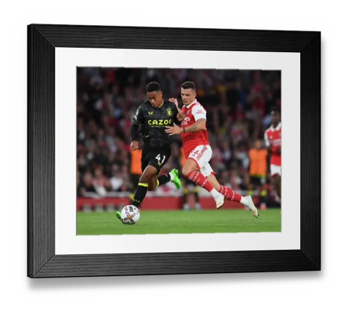 Framed Print : Xhaka vs. Ramsey: A Midfield Battle Royale in the Arsenal vs. Aston Villa Premier League Clash (2022-23)