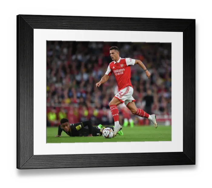 Framed Print : Xhaka vs. Ramsey: A Midfield Battle Royale in Arsenal's 2022-23 Premier League Clash with Aston Villa
