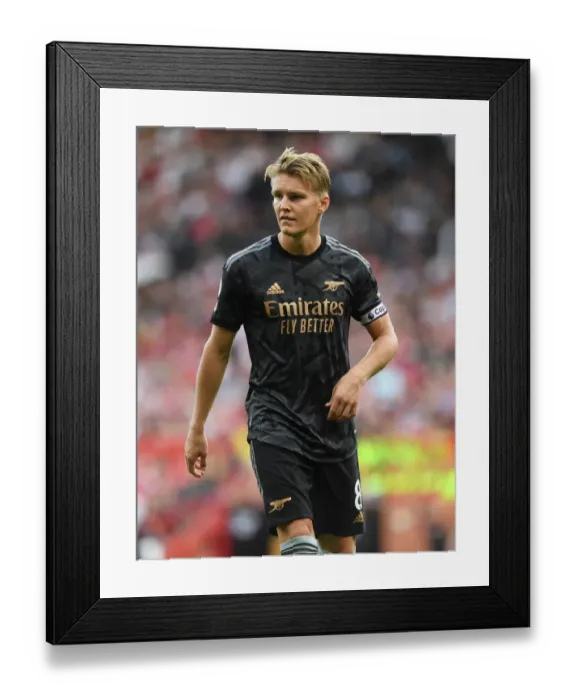 Framed Print : Arsenal's Martin Odegaard Faces Off Against Manchester United in Intense 2022-23 Premier League Showdown Framed Print : Arsenal's Martin Odegaard Faces Off Against Manchester United in Intense 2022-23 Premier League Showdown