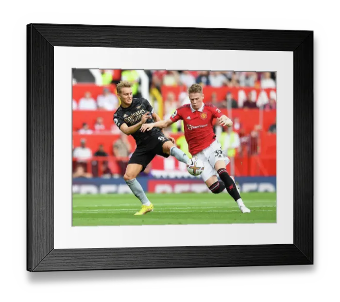 Framed Print : Clash of the Midfield Titans: Odegaard vs McTominay - A Premier League Showdown (Manchester United vs Arsenal, 2022-23) Framed Print : Clash of the Midfield Titans: Odegaard vs McTominay - A Premier League Showdown (Manchester United vs Arsenal, 2022-23)