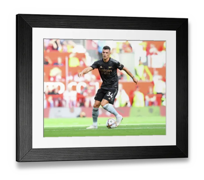Framed Print : Xhaka at Old Trafford: Arsenal vs. Manchester United, Premier League 2022-23