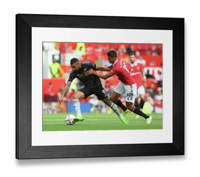 Framed Print : Gabriel Jesus vs. Raphael Varane: Battle at Old Trafford - Manchester United vs. Arsenal, Premier League 2022-23 Framed Print : Gabriel Jesus vs. Raphael Varane: Battle at Old Trafford - Manchester United vs. Arsenal, Premier League 2022-23