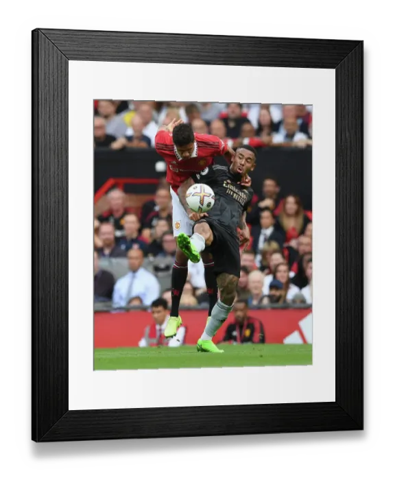 Framed Print : Gabriel Jesus vs. Raphael Varane: A Premier League Battle at Old Trafford - Manchester United vs. Arsenal, 2022-23