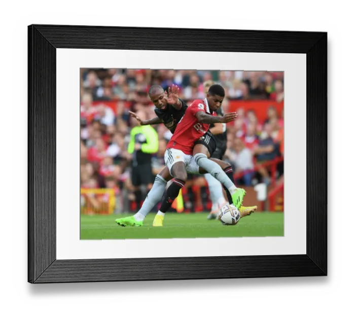 Framed Print : Clash at Old Trafford: Magalhaes vs. Rashford - Manchester United vs. Arsenal, Premier League 2022-23